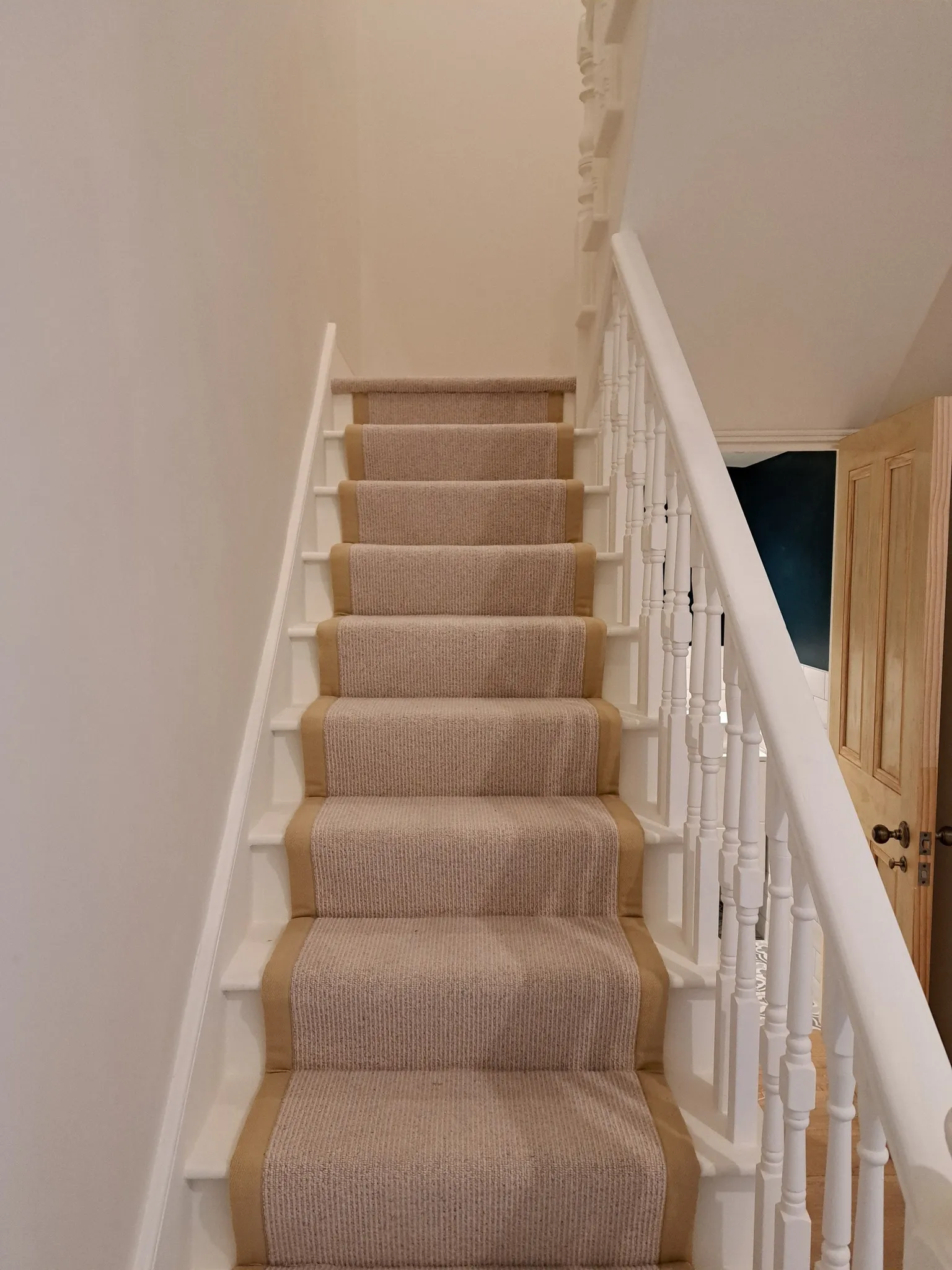 A set of stairs leading up to a second floor.